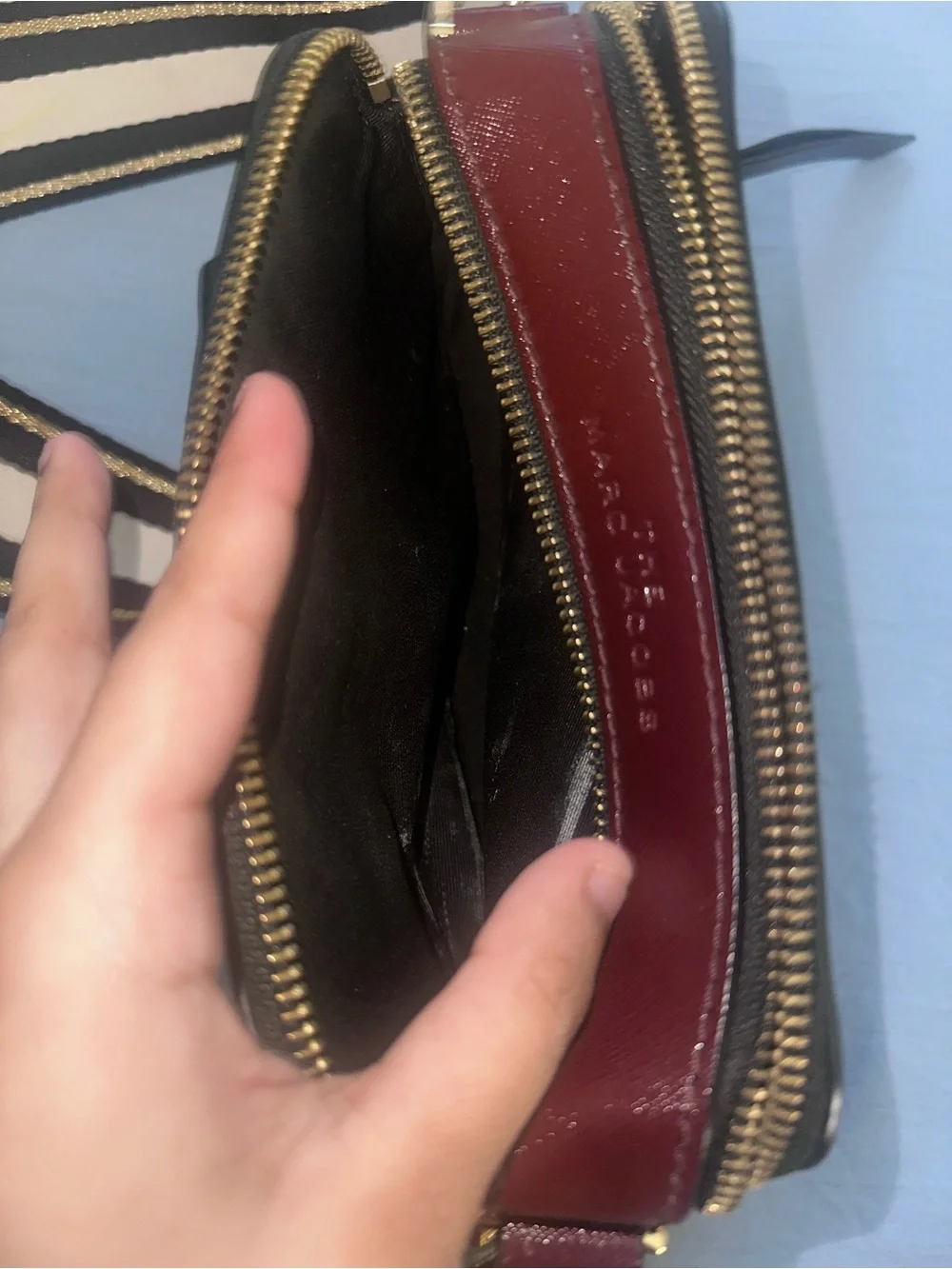 Marc Jacob’s Black and Red Crossbody Camera Bag with Gold Hardware